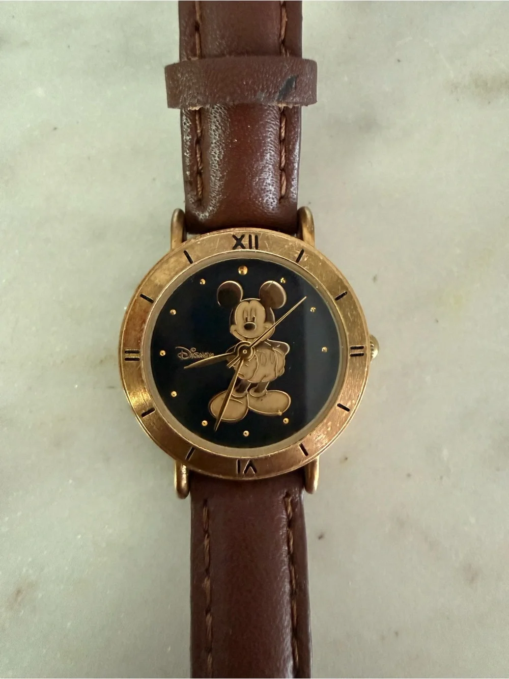 Disney gold tone